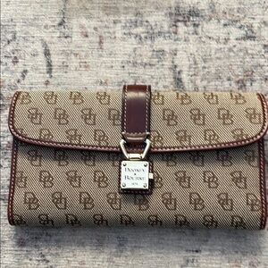 Dooney & Bourke Tan Monogram Clutch wallet.